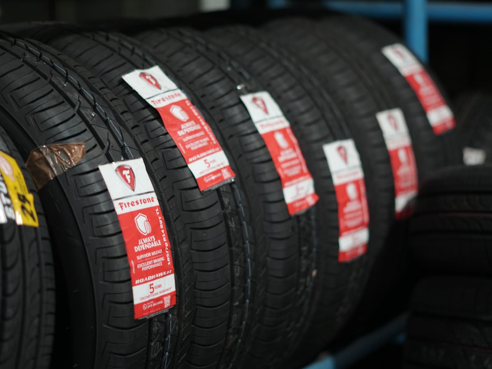 Firestone tyres stacked in the inventory rack